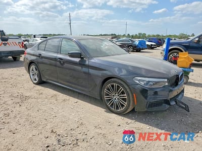 Czwarte zdjęcie samochodu z boku: 2019 BMW 530E VIN:WBAJA9C55KB392930 - miniatura