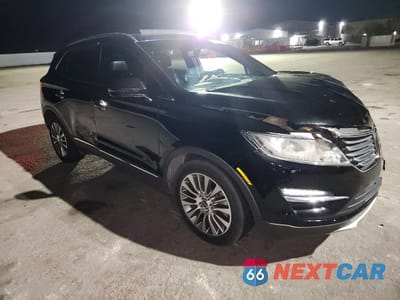 Czwarte zdjęcie samochodu z boku: 2017 LINCOLN MKC RESERVE VIN:5LMCJ3C92HUL31780 - miniatura