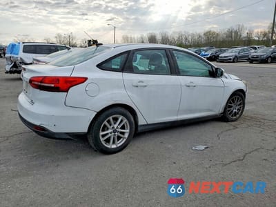 Trzecie zdjęcie samochodu z tyłu: 2016 FORD FOCUS SE VIN:1FADP3F23GL341205 - miniatura