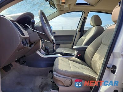 Zdjęcie 7 z 12 samochodu: 2010 FORD FOCUS SE VIN:1FAHP3FN2AW190505 - miniatura