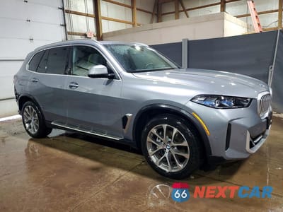 Czwarte zdjęcie samochodu z boku: 2026 BMW X5 XDRIVE40I VIN:5UX23EU05T9083401 - miniatura