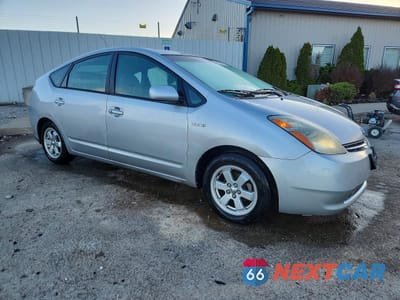 Czwarte zdjęcie samochodu z boku: 2006 TOYOTA PRIUS BASE VIN:JTDKB20U967060439 - miniatura