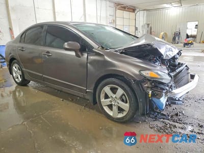 Czwarte zdjęcie samochodu z boku: 2011 HONDA CIVIC LX VIN:2HGFA1F57BH505856 - miniatura