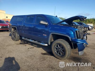 Czwarte zdjęcie samochodu z boku: 2017 GMC SIERRA K1500 SLT VIN:3GTU2NEC8HG382474 - miniatura