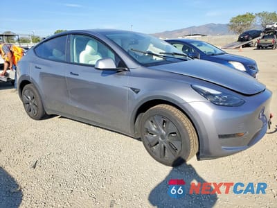 Czwarte zdjęcie samochodu z boku: 2024 TESLA MODEL Y VIN:7SAYGDEDXRF192305 - miniatura