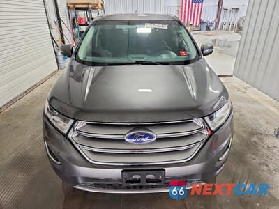 Piąte zdjęcie samochodu w środku: 2016 FORD EDGE TITANIUM VIN:2FMPK4K81GBB12975 - miniatura