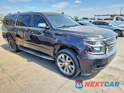 Czwarte zdjęcie samochodu z boku: 2015 CHEVROLET SUBURBAN K1500 LTZ VIN:1GNSKKKC5FR176785 - miniatura