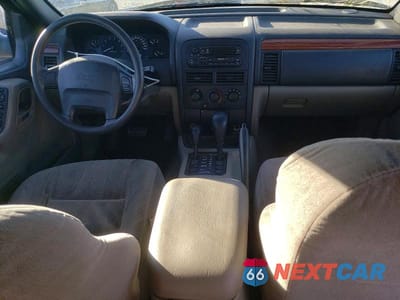 Zdjęcie 8 z 12 samochodu: 1999 JEEP GRAND CHEROKEE LAREDO VIN:1J4GW58S6XC784073 - miniatura