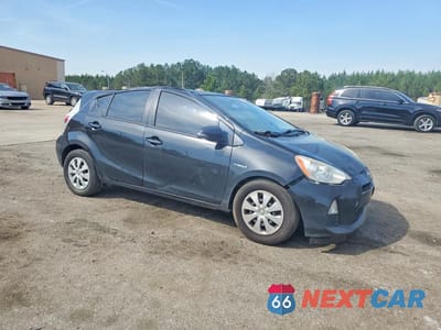 Czwarte zdjęcie samochodu z boku: 2014 TOYOTA PRIUS C TWO VIN:JTDKDTB30E1082884 - miniatura