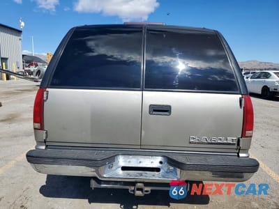 Zdjęcie 6 z 12 samochodu: 1999 CHEVROLET TAHOE C1500 VIN:1GNEC13R3XJ551161 - miniatura
