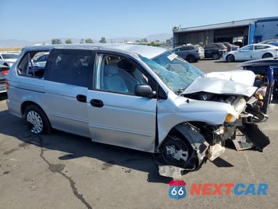 Czwarte zdjęcie samochodu z boku: 2003 HONDA ODYSSEY LX VIN:5FNRL18563B112747 - miniatura