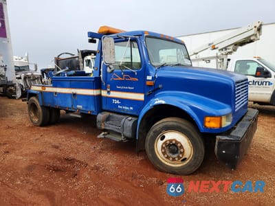 Czwarte zdjęcie samochodu z boku: 1996 INTERNATIONAL 4700 TOW TRUCK VIN:1HTSCAAM5TH326568 - miniatura
