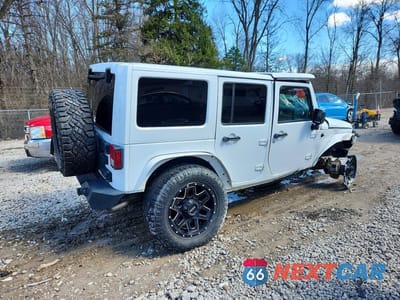 Trzecie zdjęcie samochodu z tyłu: 2016 JEEP WRANGLER UNLIMITED SAHARA VIN:1C4BJWEGXGL107869 - miniatura