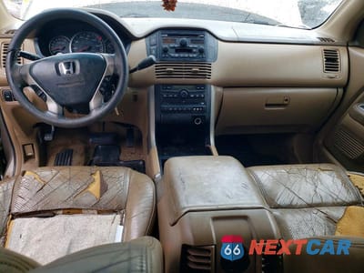 Zdjęcie 8 z 13 samochodu: 2004 HONDA PILOT EXL VIN:2HKYF18504H508548 - miniatura