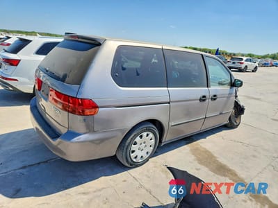 Trzecie zdjęcie samochodu z tyłu: 2000 HONDA ODYSSEY VIN:2HKRL1855YH552113 - miniatura