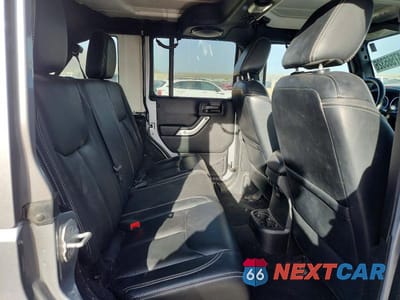 Zdjęcie 10 z 12 samochodu: 2014 JEEP WRANGLER UNLIMITED RUBICON VIN:1C4BJWFG9EL186317 - miniatura