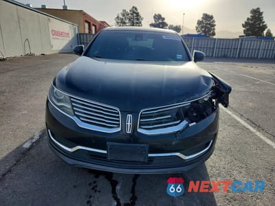 Piąte zdjęcie samochodu w środku: 2016 LINCOLN MKX RESERVE VIN:2LMTJ8LR4GBL43938 - miniatura