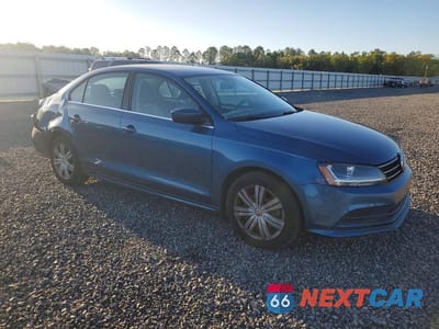 Czwarte zdjęcie samochodu z boku: 2017 VOLKSWAGEN JETTA S VIN:3VW2B7AJXHM255957 - miniatura