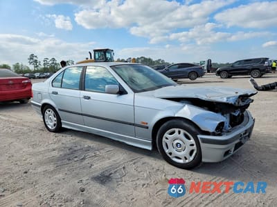 Czwarte zdjęcie samochodu z boku: 1997 BMW 318 I VIN:WBACC9328VEE56697 - miniatura