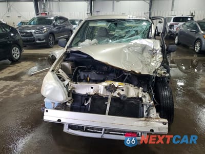 Piąte zdjęcie samochodu w środku: 2003 TOYOTA ECHO BASE VIN:JTDBT123030275448 - miniatura