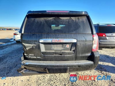 Zdjęcie 6 z 11 samochodu: 2015 GMC YUKON XL DENALI VIN:1GKS2JKJ0FR504605 - miniatura