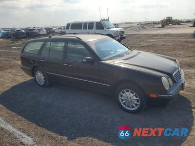Czwarte zdjęcie samochodu z boku: 2003 MERCEDES-BENZ E 320 4MATIC VIN:WDBJH82J23X084088 - miniatura
