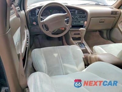 Zdjęcie 8 z 11 samochodu: 1993 TOYOTA CAMRY LE VIN:4T1SK12E8PU323597 - miniatura