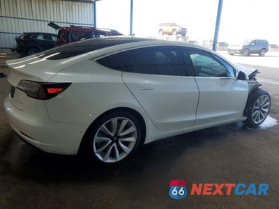 Trzecie zdjęcie samochodu z tyłu: 2019 TESLA MODEL 3 VIN:5YJ3E1EB1KF392487 - miniatura