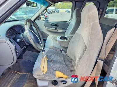 Zdjęcie 7 z 12 samochodu: 1999 FORD F150 VIN:1FTRX17L6XNB83989 - miniatura