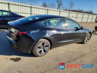 Trzecie zdjęcie samochodu z tyłu: 2023 TESLA MODEL 3 VIN:5YJ3E1EA5PF650752 - miniatura