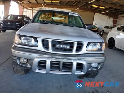 Piąte zdjęcie samochodu w środku: 2002 ISUZU RODEO SPORT VIN:4S2CK57W924302451 - miniatura