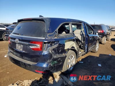 Trzecie zdjęcie samochodu z tyłu: 2018 HONDA ODYSSEY EXL VIN:5FNRL6H7XJB078534 - miniatura