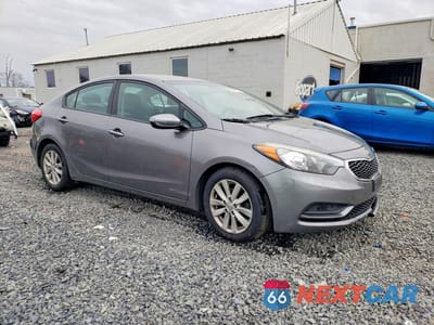Czwarte zdjęcie samochodu z boku: 2016 KIA FORTE LX VIN:KNAFX4A6XG5584434 - miniatura