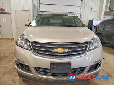 Piąte zdjęcie samochodu w środku: 2014 CHEVROLET TRAVERSE LT VIN:1GNKRGKD3EJ127633 - miniatura