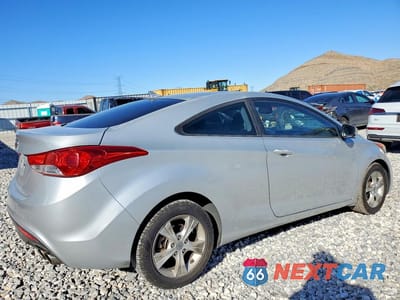 Trzecie zdjęcie samochodu z tyłu: 2013 HYUNDAI ELANTRA COUPE GS VIN:KMHDH6AE1DU007430 - miniatura