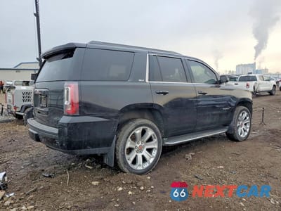 Trzecie zdjęcie samochodu z tyłu: 2016 GMC YUKON SLT VIN:1GKS2BKC4GR216126 - miniatura