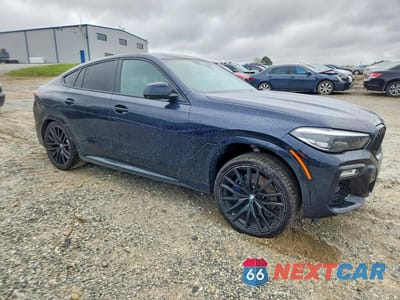 Czwarte zdjęcie samochodu z boku: 2021 BMW X6 M50I VIN:5UXCY8C01M9F58300 - miniatura