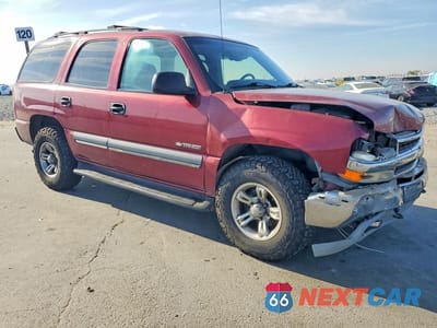Czwarte zdjęcie samochodu z boku: 2002 CHEV TAHOE K1500 LTZ VIN:1GNEK13T92J173709 - miniatura