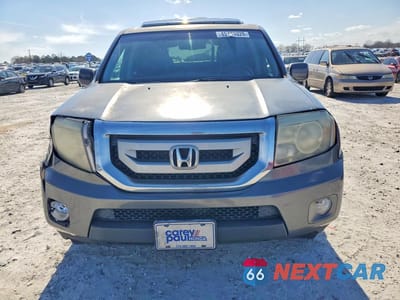 Piąte zdjęcie samochodu w środku: 2011 HONDA PILOT EXL VIN:5FNYF3H57BB050272 - miniatura