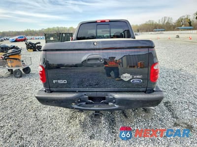 Zdjęcie 6 z 12 samochodu: 2000 FORD F150 VIN:2FTRX07L5YCB16298 - miniatura