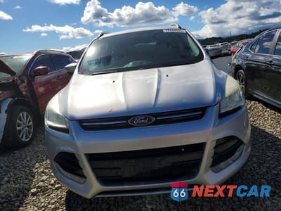 Piąte zdjęcie samochodu w środku: 2014 FORD ESCAPE TITANIUM VIN:1FMCU9J90EUD26377 - miniatura