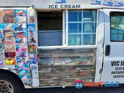 Zdjęcie 11 z 14 samochodu: 2007 CHEVROLET EXPRESS 1500 FOOD TRUCK VIN:1GCFG15X571250811 - miniatura