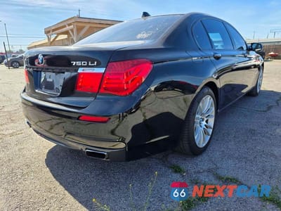 Czwarte zdjęcie samochodu z boku: 2011 BMW 750 LI VIN:WBAKC8C53BC431842 - miniatura