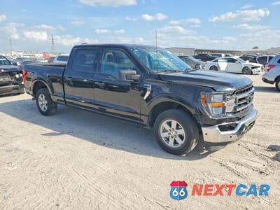 Czwarte zdjęcie samochodu z boku: 2023 FORD F150 SUPERCREW VIN:1FTEW1CP4PKD33674 - miniatura