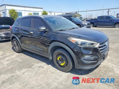 Czwarte zdjęcie samochodu z boku: 2016 HYUNDAI TUCSON VIN:KM8J33A24GU047706 - miniatura