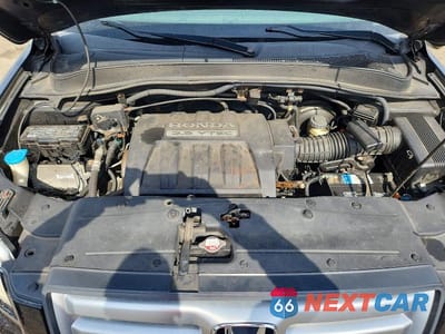 Zdjęcie 12 z 12 samochodu: 2006 HONDA PILOT EX VIN:2HKYF18586H558245 - miniatura