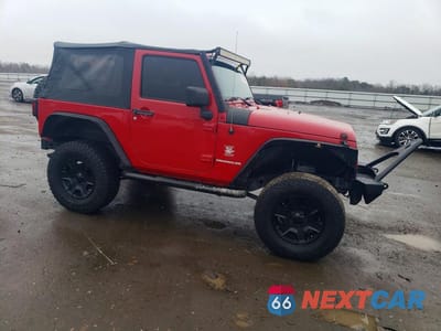 Czwarte zdjęcie samochodu z boku: 2012 JEEP WRANGLER SPORT VIN:1C4AJWAG3CL269595 - miniatura