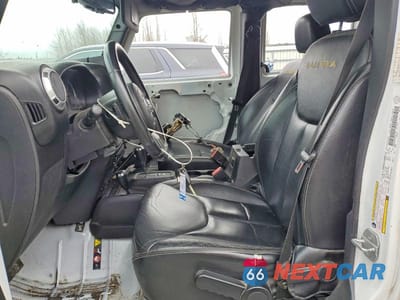 Zdjęcie 7 z 13 samochodu: 2013 JEEP WRANGLER UNLIMITED SAHARA VIN:1C4BJWEG8DL695038 - miniatura