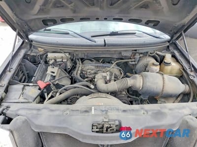 Zdjęcie 11 z 12 samochodu: 2007 FORD F150 VIN:1FTRF12247NA25023 - miniatura