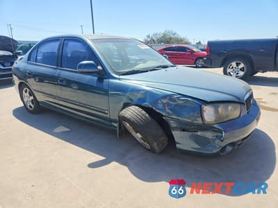 Czwarte zdjęcie samochodu z boku: 2002 HYUNDAI ELANTRA GLS VIN:KMHDN45D22U418489 - miniatura